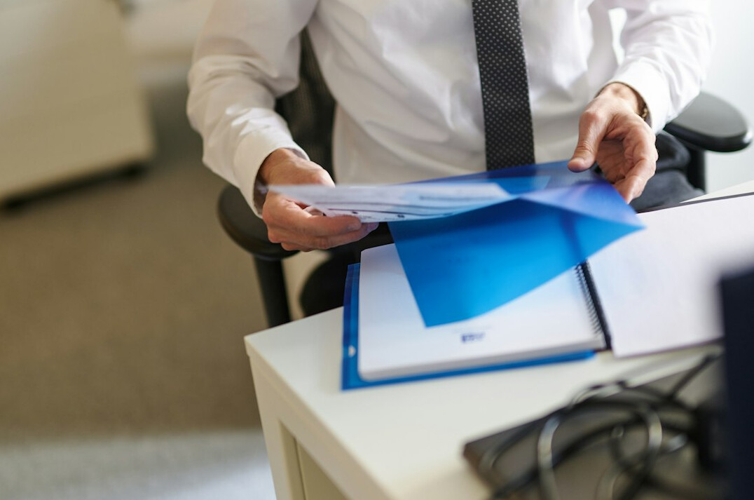 private detective reviewing documents